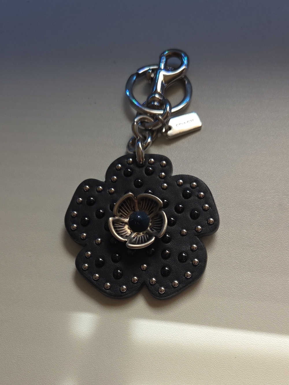 Coach Black Leather Flower Stud Keychain Charm with Silver Hardware